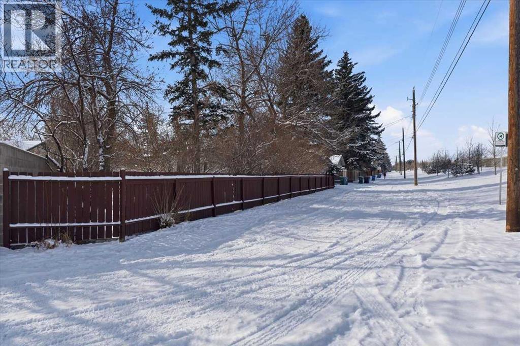 6004 Louise Road SW, Calgary, Alberta  T3E 5V2 - Photo 12 - A2292002