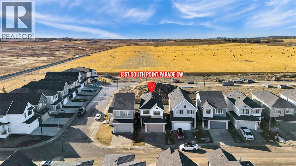 1357 South Point Parade Sw, Airdrie, Alberta  T4B 5P3 - Photo 3 - A2296206