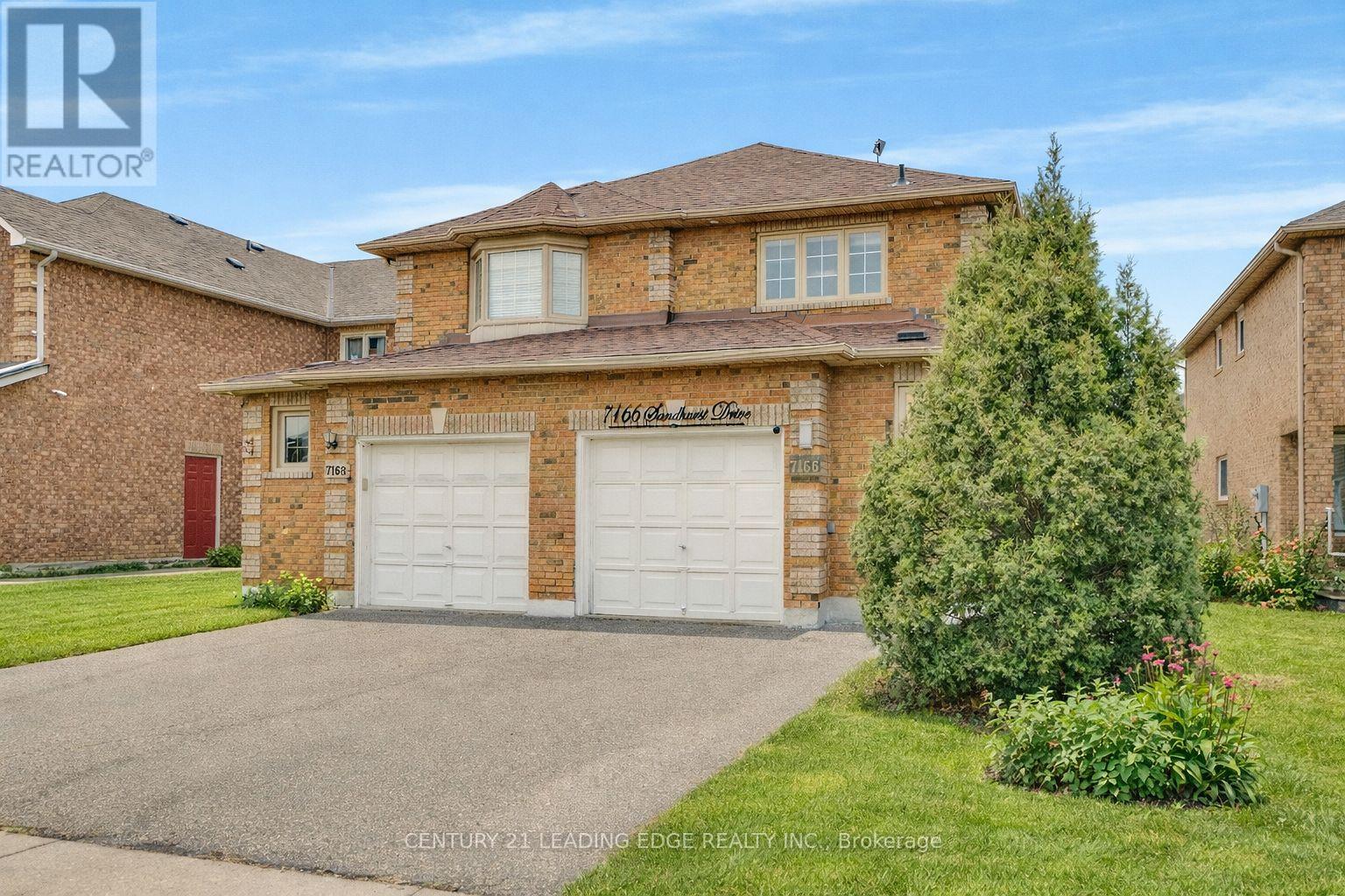 7166 Sandhurst Drive, Mississauga, Ontario  L5N 7H1 - Photo 2 - W12932354