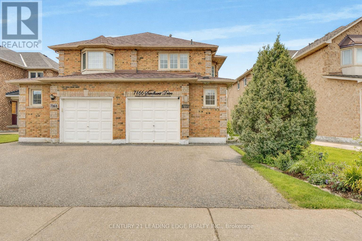 7166 Sandhurst Drive, Mississauga, Ontario  L5N 7H1 - Photo 4 - W12932354