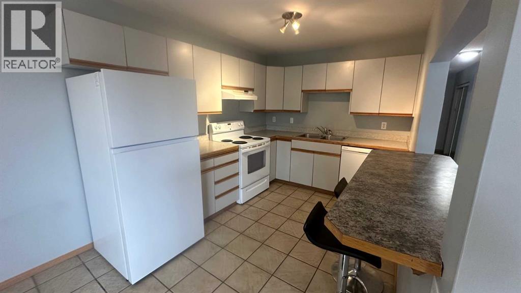 8, 6203 Bowness Road NW, Calgary, Alberta