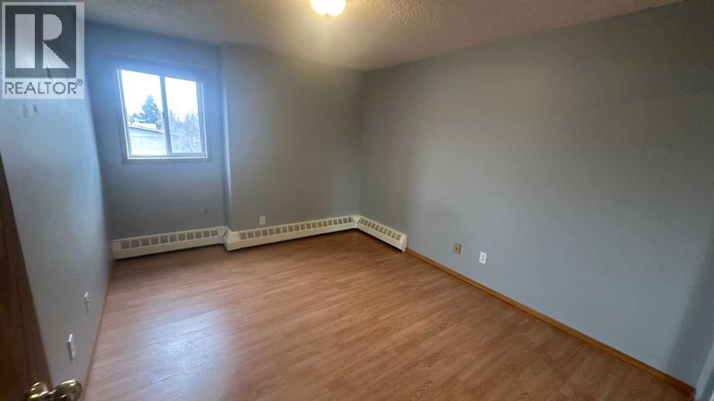 8, 6203 Bowness Road NW, Calgary, Alberta  T3B 0E2 - Photo 6 - A2296202