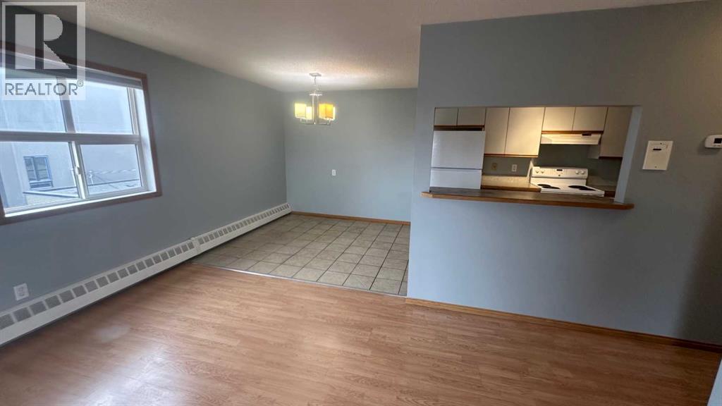 8, 6203 Bowness Road NW, Calgary, Alberta  T3B 0E2 - Photo 2 - A2296202