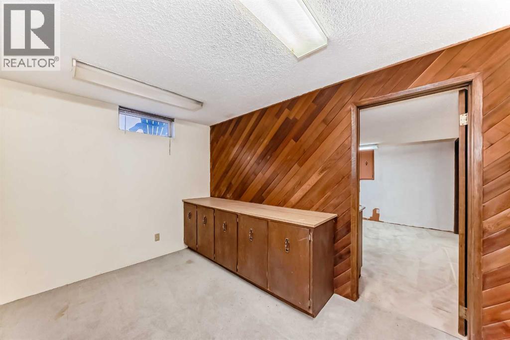 6007 Dalcastle Crescent Nw, Calgary, Alberta  T3A 1R7 - Photo 28 - A2292768