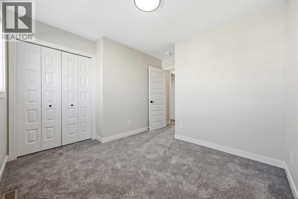 1047 Bayview Crescent, Airdrie, Alberta  T4B 5N5 - Photo 28 - A2296198