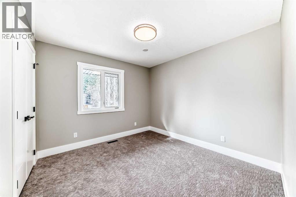 1256 Lake Twintree Drive Se, Calgary, Alberta  T2J 2T2 - Photo 24 - A2296481