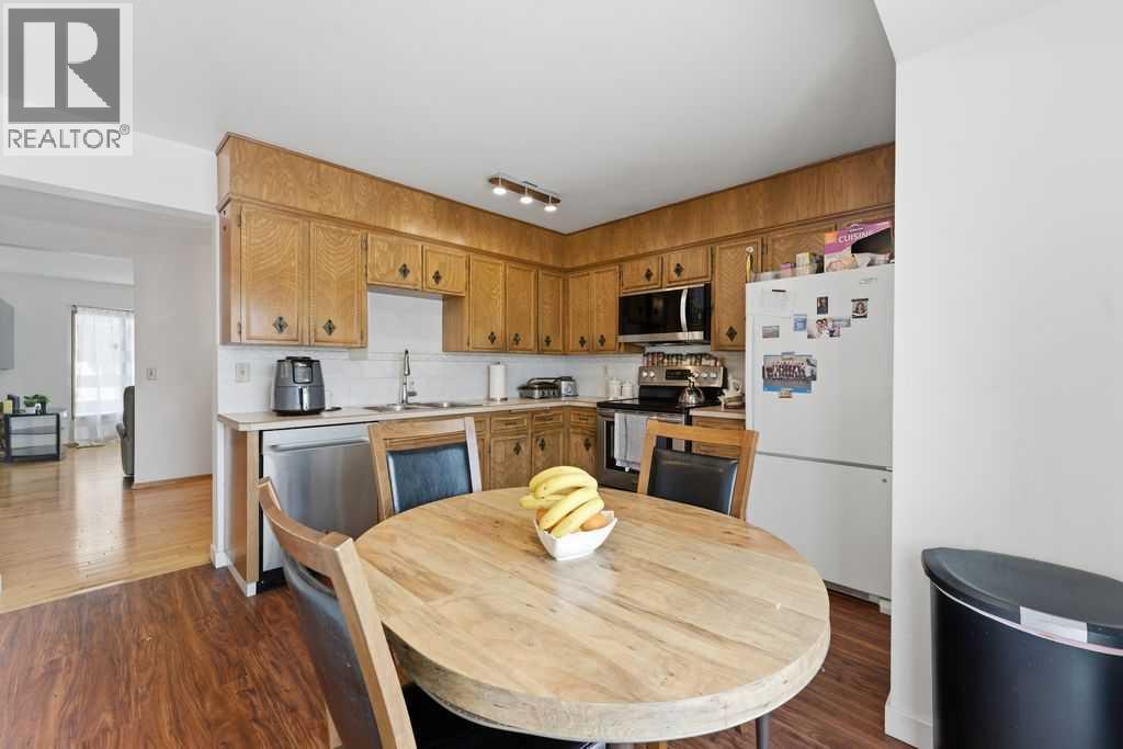 1447 Berkley Drive Nw, Calgary, Alberta  t3k 1t6 - Photo 14 - A2278837