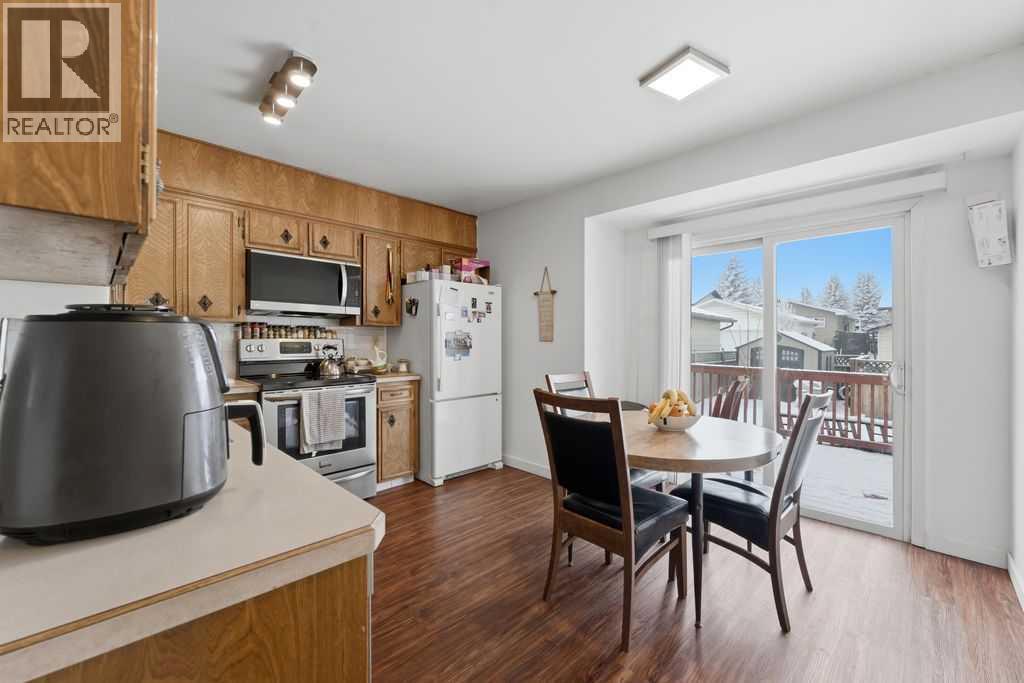 1447 Berkley Drive Nw, Calgary, Alberta  t3k 1t6 - Photo 8 - A2278837