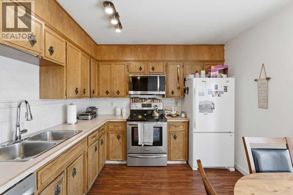 1447 Berkley Drive Nw, Calgary, Alberta  t3k 1t6 - Photo 13 - A2278837