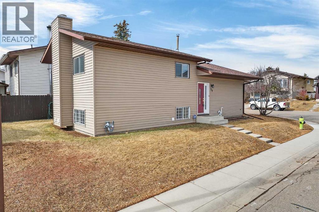 59 Taraglen Court NE, Calgary, Alberta  T3J 2M7 - Photo 4 - A2296094