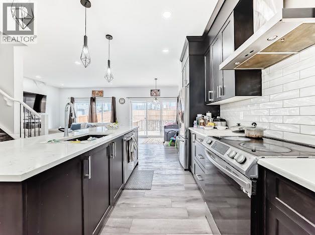 198 Lucas Heights NW, Calgary, Alberta  T3P 1X4 - Photo 5 - A2295301