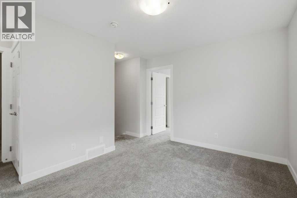 311 Wolf Creek Way Se, Calgary, Alberta  T2X 4Y8 - Photo 27 - A2290796