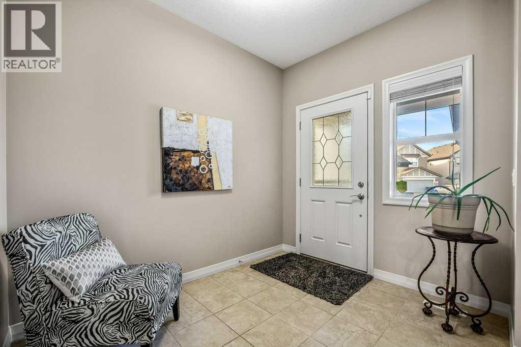 103 Panamount Common Nw, Calgary, Alberta  T3K 0P5 - Photo 3 - A2284041