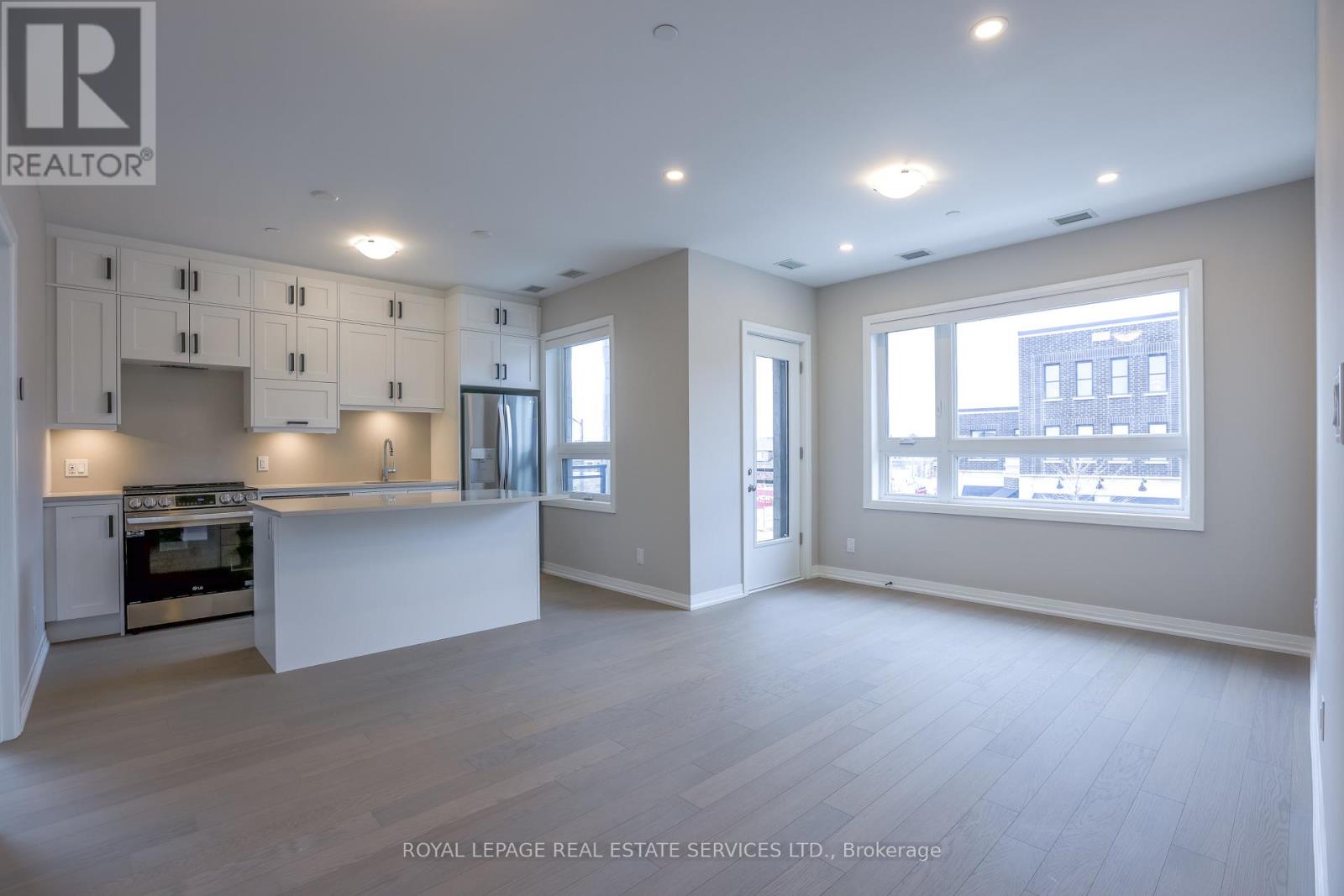 203 - 3285 Carding Mill Trail, Oakville, Ontario  L6M 5P7 - Photo 2 - W12933062