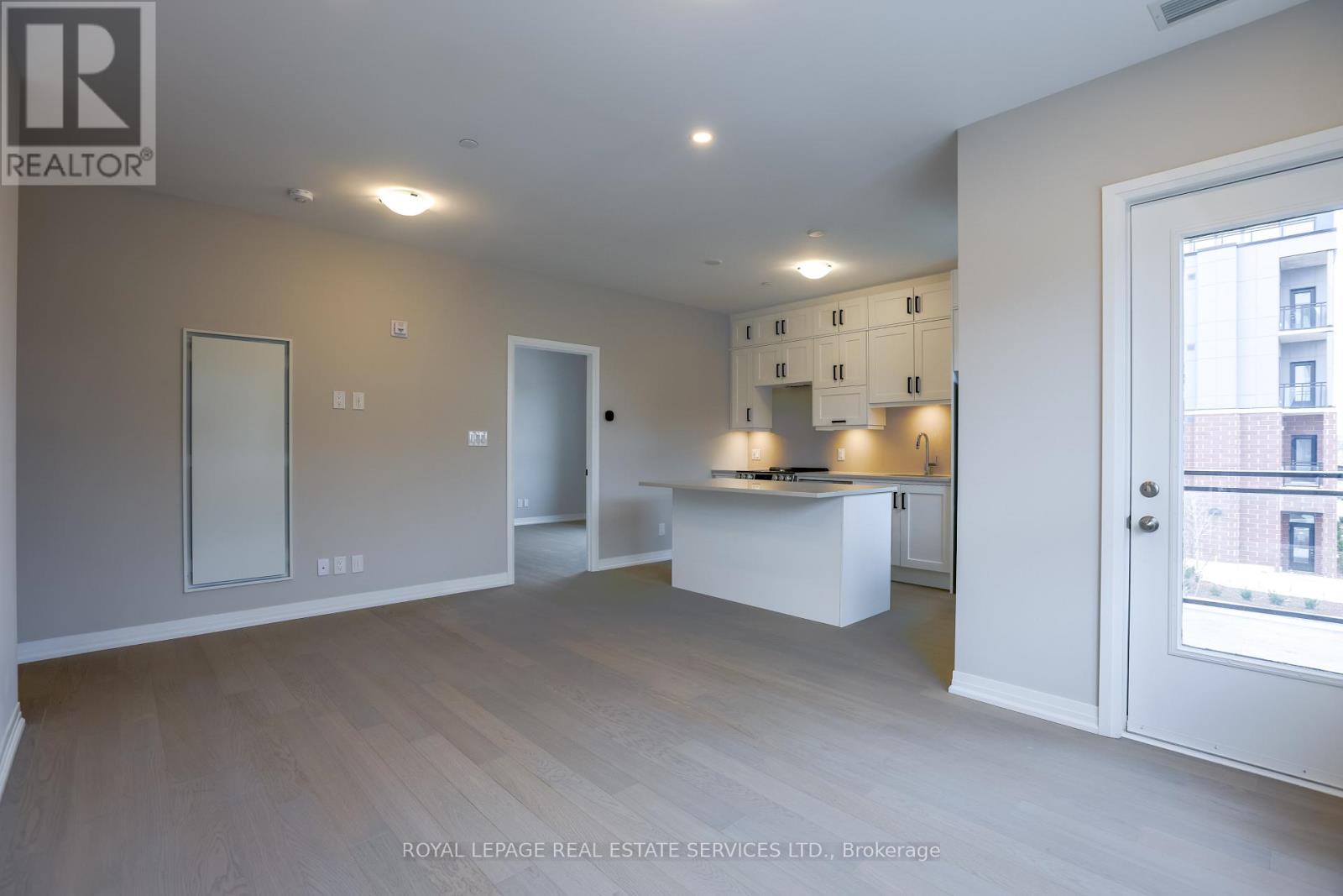 203 - 3285 Carding Mill Trail, Oakville, Ontario  L6M 5P7 - Photo 4 - W12933062