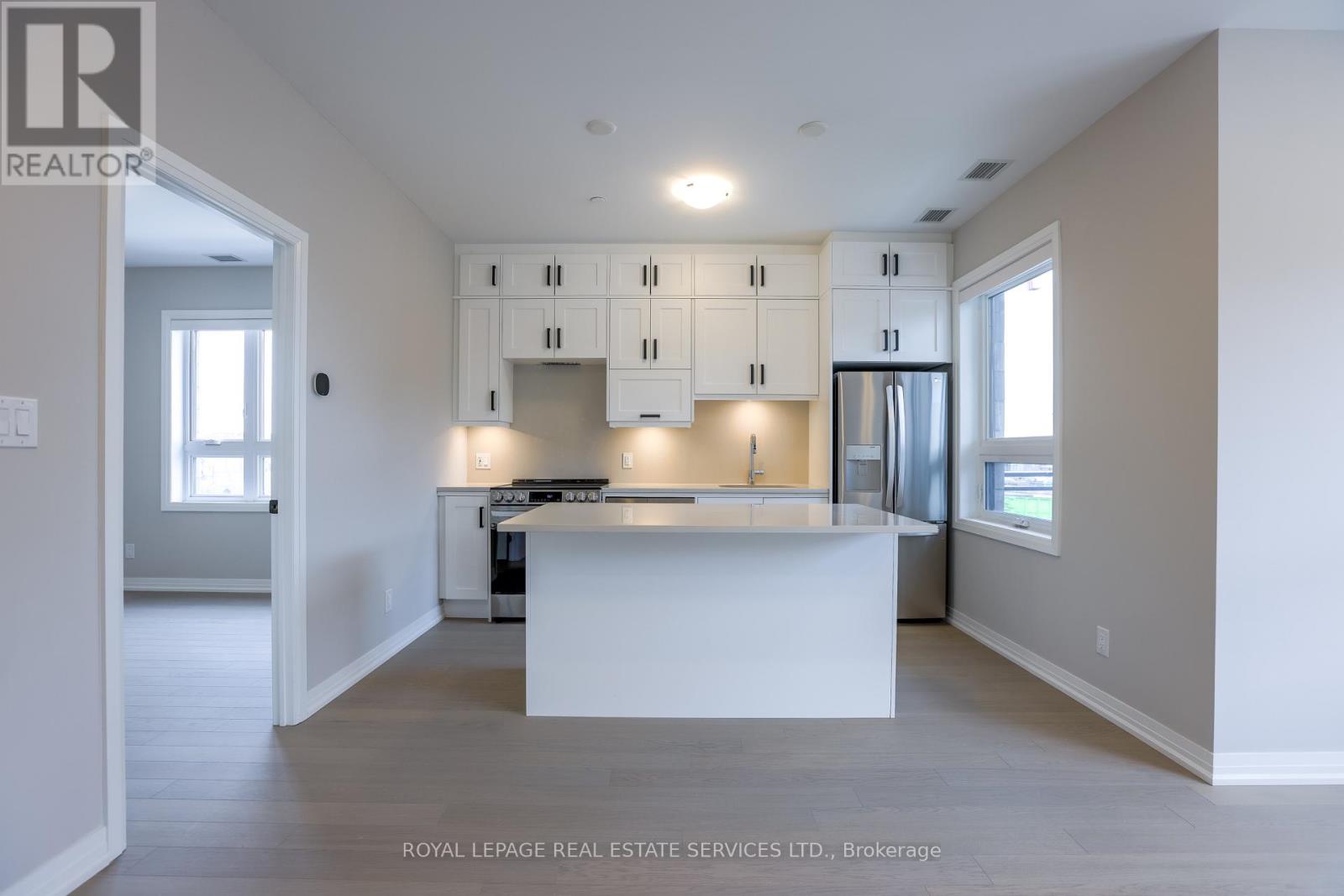 203 - 3285 Carding Mill Trail, Oakville, Ontario  L6M 5P7 - Photo 6 - W12933062