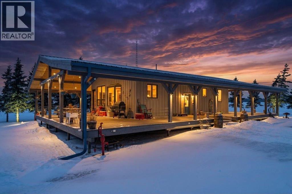 <div class="slider-price">$750,000.00</div><p>742049 Range Road 34, Teepee Creek, Alberta</p>