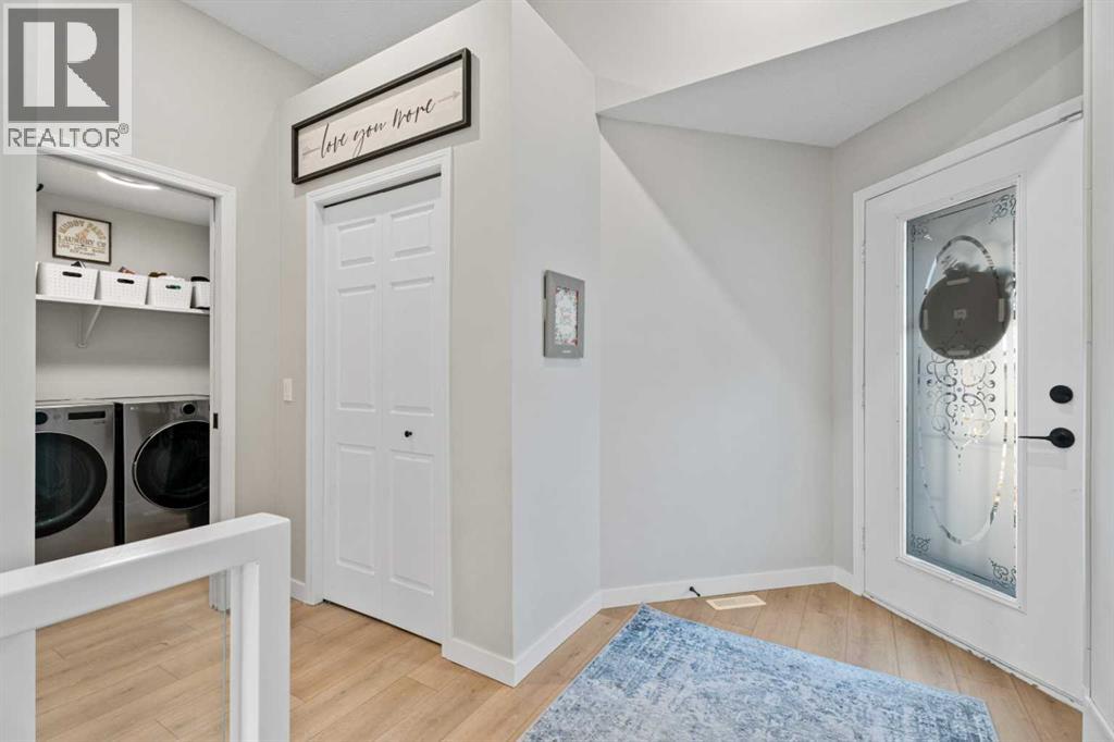 117 Rocky Ridge Landing Nw, Calgary, Alberta  t3g 4h5 - Photo 5 - A2293275