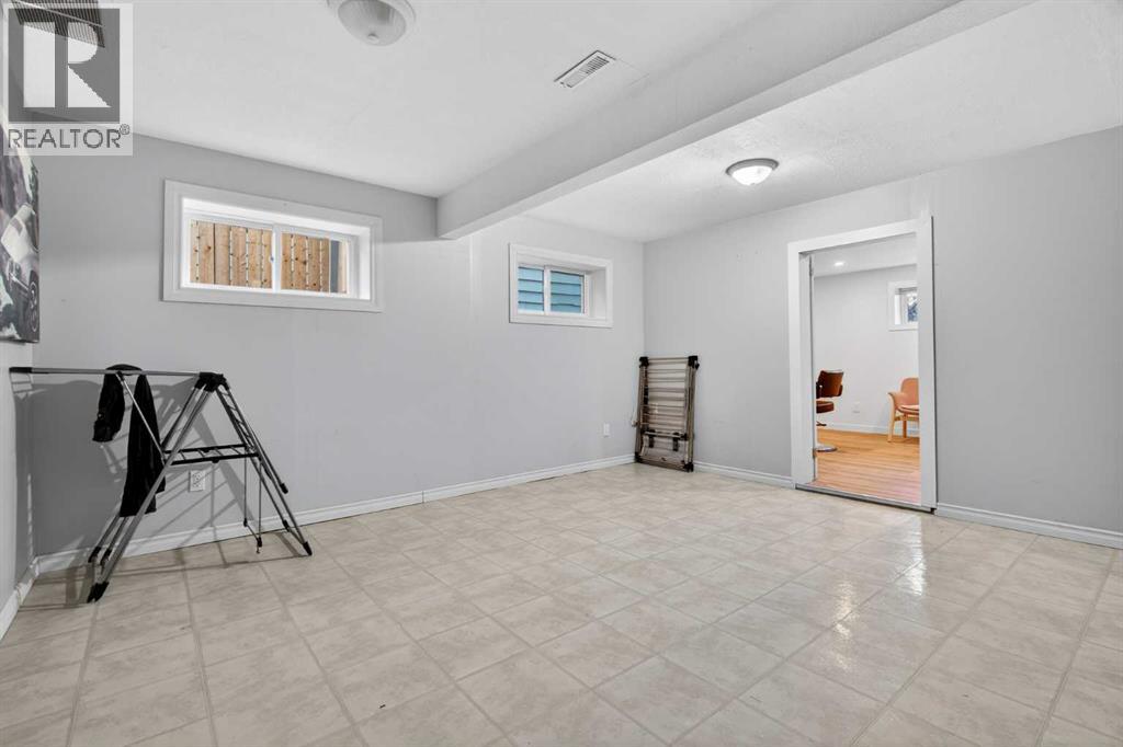 303 Woodside Place, Okotoks, Alberta  T1S 1L9 - Photo 40 - A2285284