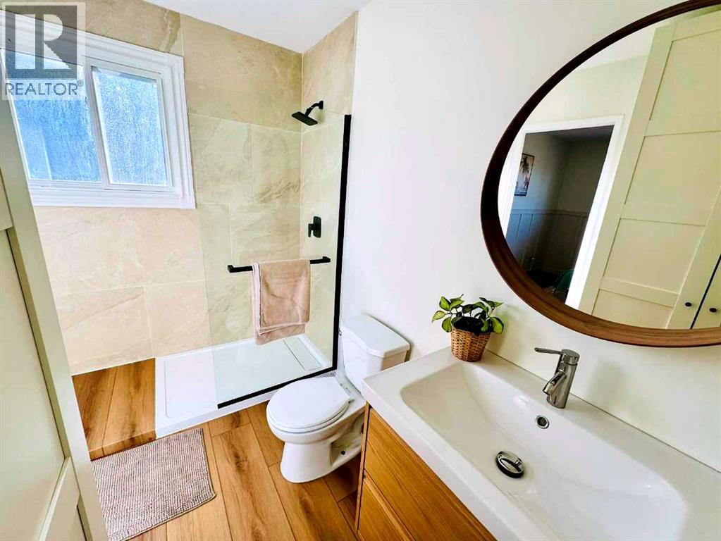 303 Woodside Place, Okotoks, Alberta  T1S 1L9 - Photo 38 - A2285284