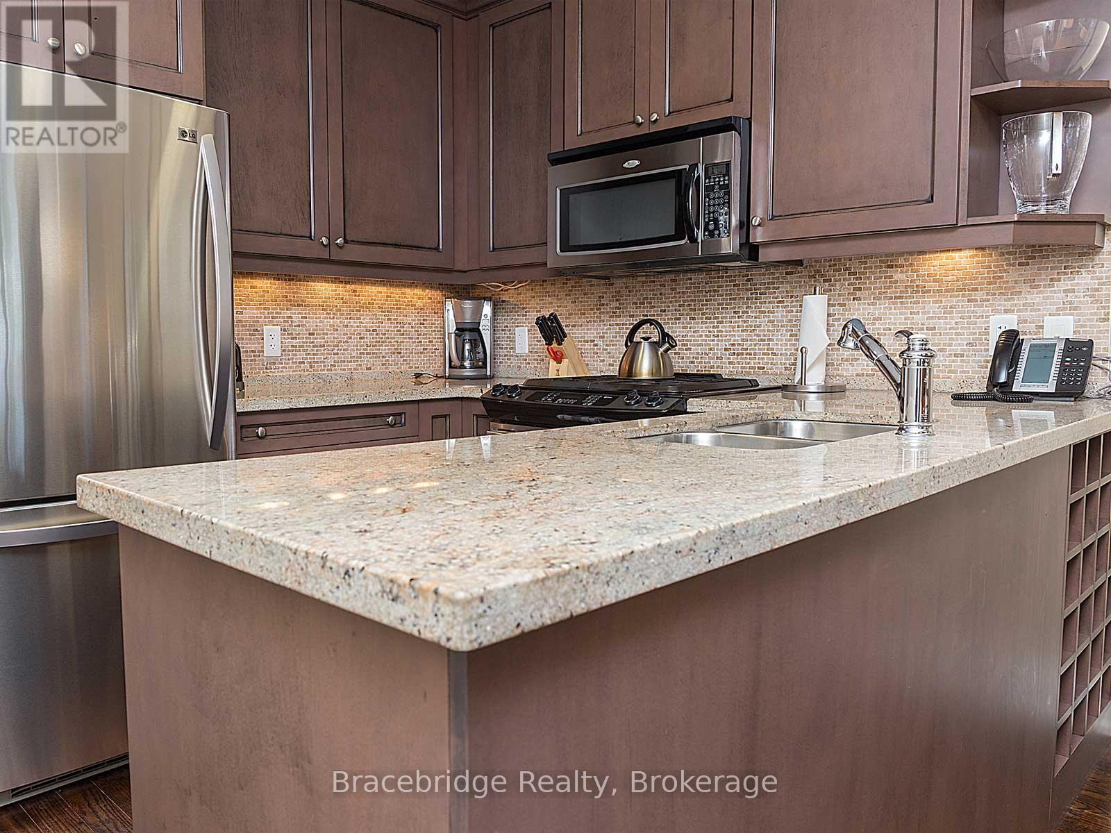 A103-D1 - 1869 Muskoka Rd 118 Highway W, Muskoka Lakes, Ontario  P1L 1W8 - Photo 5 - X12933372