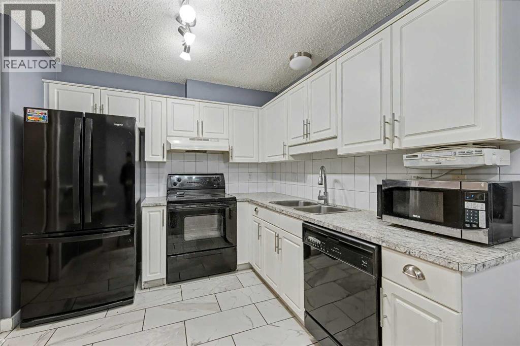 120, 10 Sierra Morena Mews SW, Calgary, Alberta  T3H 3K5 - Photo 2 - A2290585