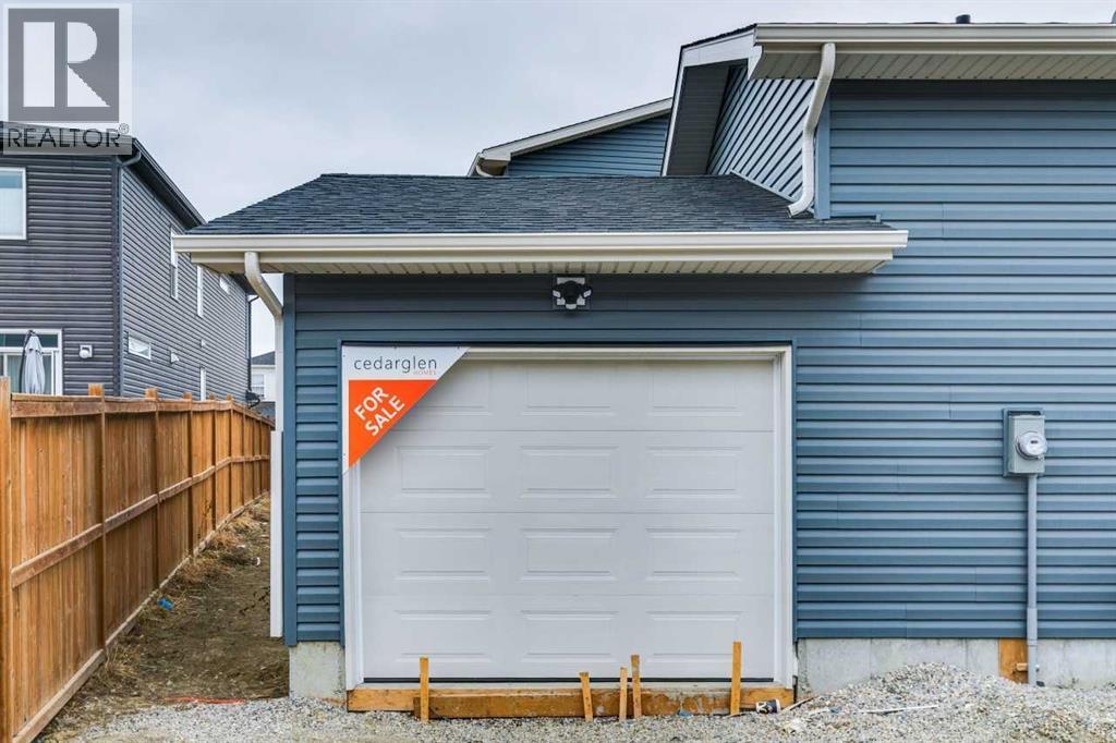 572 Belmont Heath Sw, Calgary, Alberta  T0L 0X0 - Photo 39 - A2284249