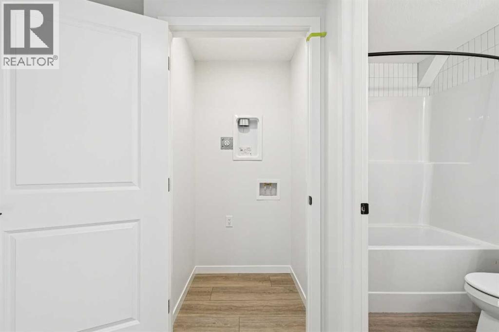 572 Belmont Heath Sw, Calgary, Alberta  T0L 0X0 - Photo 46 - A2284249