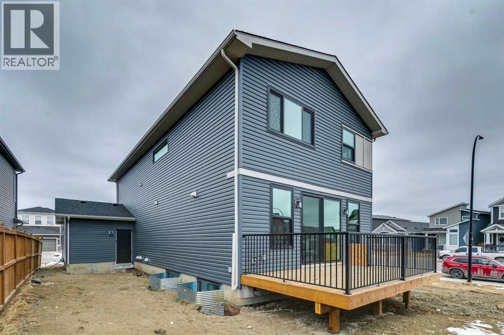 572 Belmont Heath Sw, Calgary, Alberta  T0L 0X0 - Photo 48 - A2284249