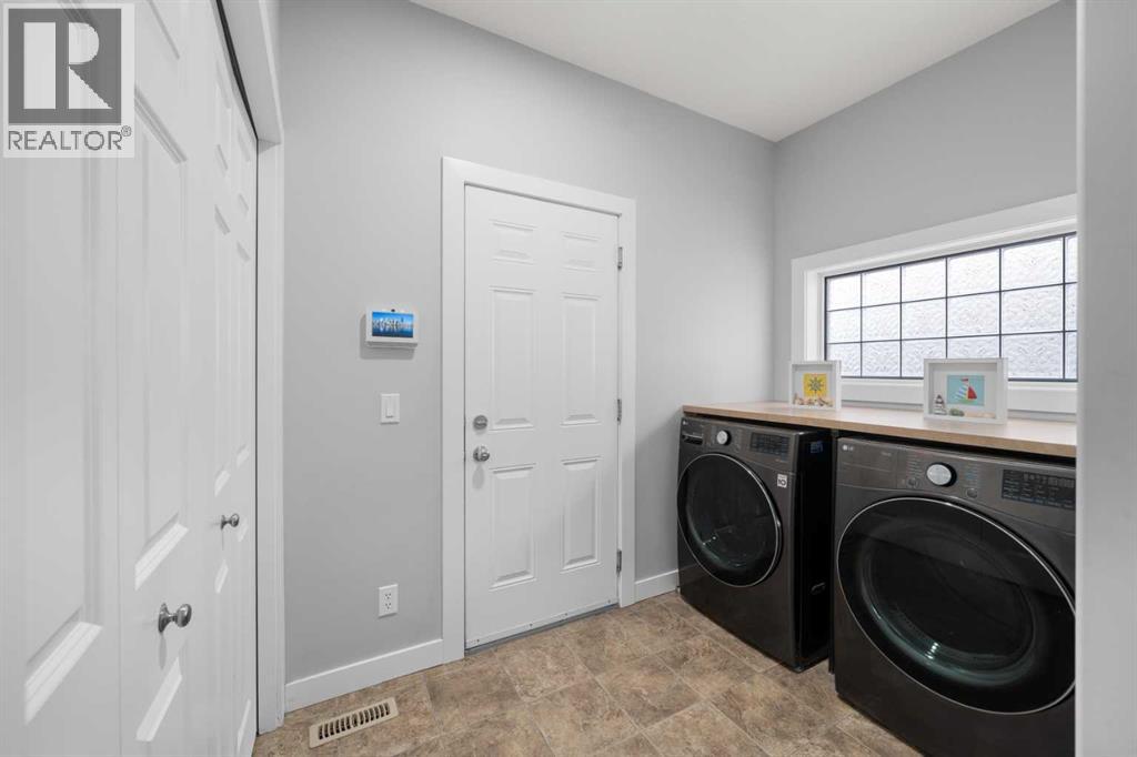 444 Crystal Green Manor, Okotoks, Alberta  T1S 0A3 - Photo 19 - A2288533