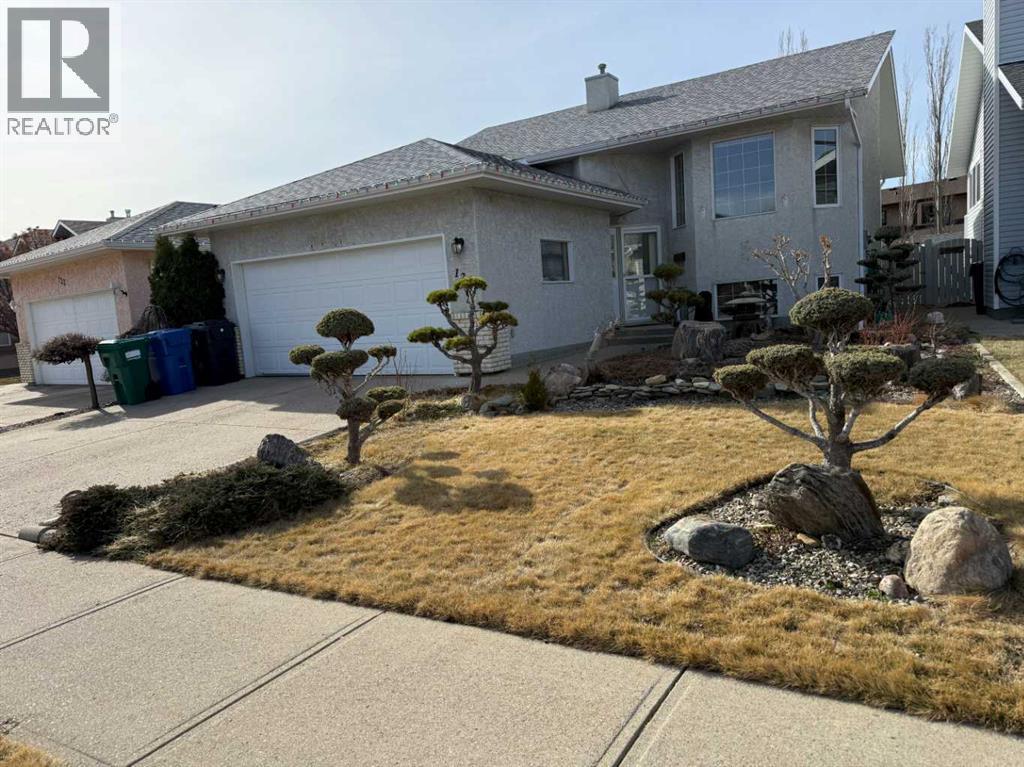 128 Heritage Boulevard W, Lethbridge, Alberta  T1K 6R9 - Photo 1 - A2294679