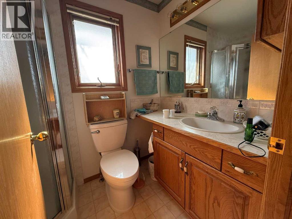 128 Heritage Boulevard W, Lethbridge, Alberta  T1K 6R9 - Photo 10 - A2294679