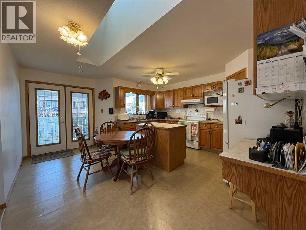 128 Heritage Boulevard W, Lethbridge, Alberta  T1K 6R9 - Photo 4 - A2294679