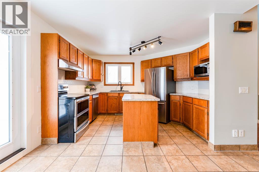 215 Scenic Way Nw, Calgary, Alberta  T3L 1B6 - Photo 12 - A2294245