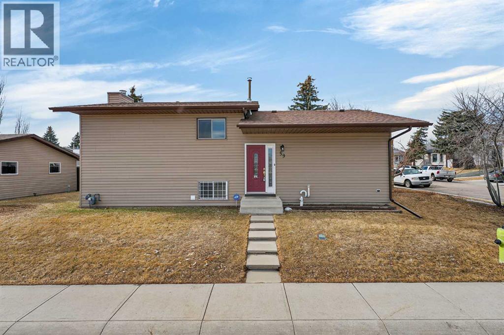 59 Taraglen Court Ne, Calgary, Alberta  T3J 2M7 - Photo 3 - A2296094