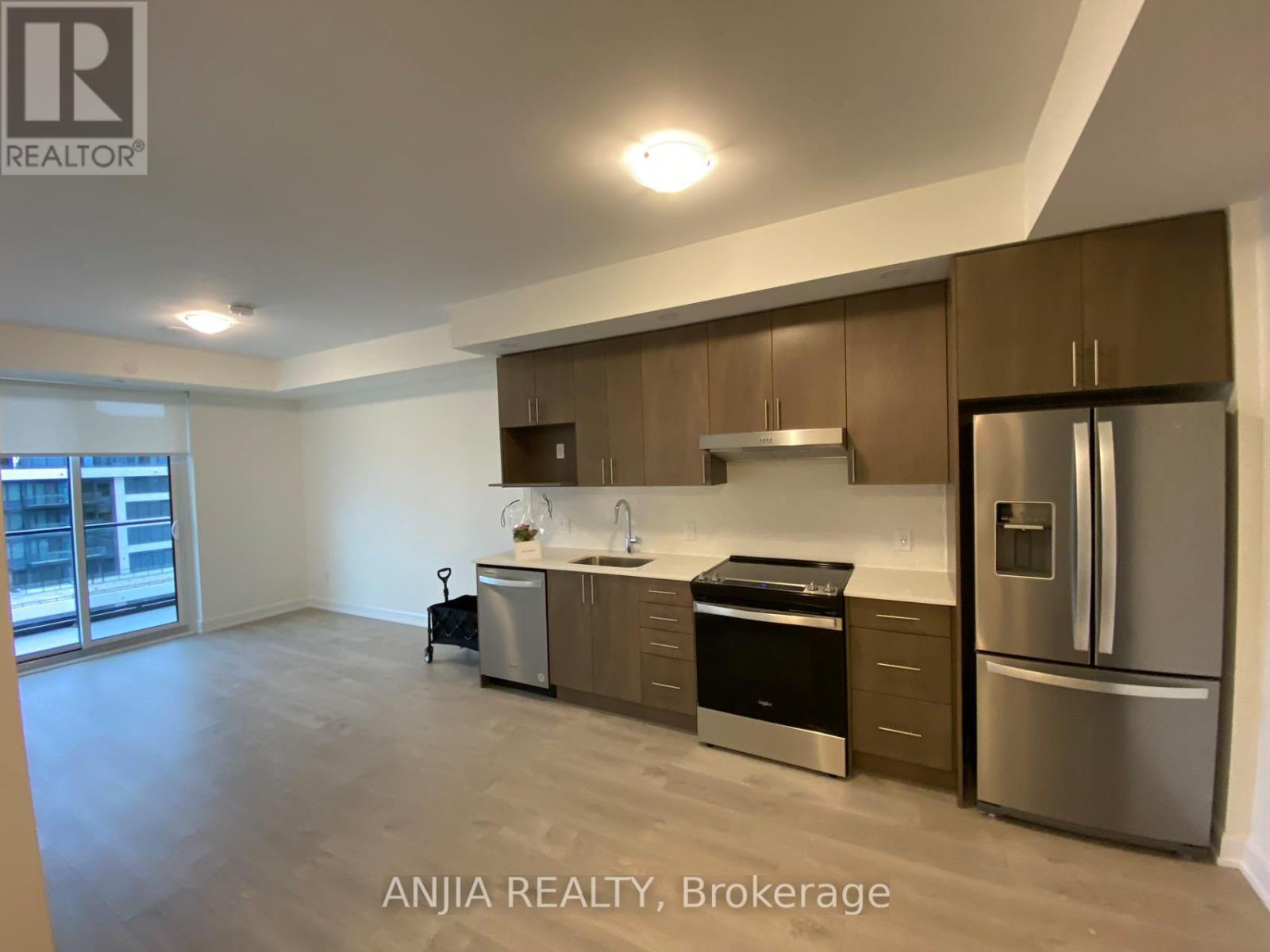 1217 - 3220 William Coltson Avenue, Oakville, Ontario  L6H 7X9 - Photo 4 - W12933590