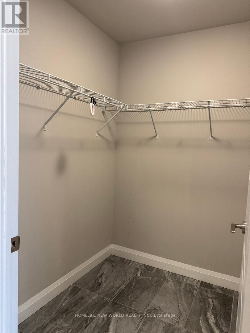 216 - 15 Water Walk Drive, Markham, Ontario  L6G 0G2 - Photo 10 - N12933642