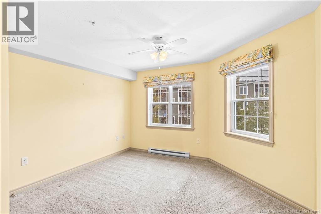 1 Golf Greens Lane Unit# 409, Fredericton, New Brunswick  E3B 9T9 - Photo 34 - NB136037