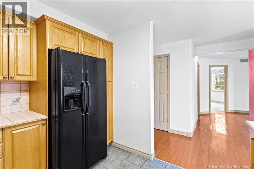 1 Golf Greens Lane Unit# 409, Fredericton, New Brunswick  E3B 9T9 - Photo 25 - NB136037