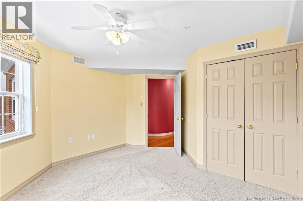 1 Golf Greens Lane Unit# 409, Fredericton, New Brunswick  E3B 9T9 - Photo 36 - NB136037