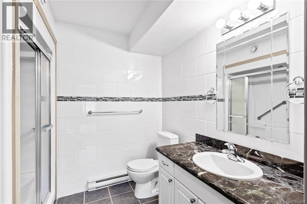 1 Golf Greens Lane Unit# 409, Fredericton, New Brunswick  E3B 9T9 - Photo 29 - NB136037