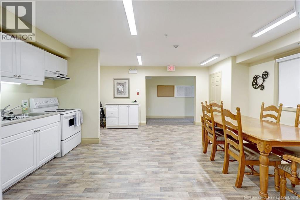 1 Golf Greens Lane Unit# 409, Fredericton, New Brunswick  E3B 9T9 - Photo 41 - NB136037