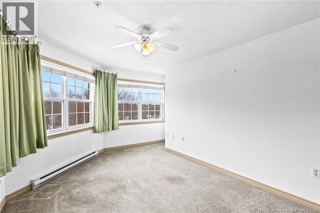 1 Golf Greens Lane Unit# 409, Fredericton, New Brunswick  E3B 9T9 - Photo 32 - NB136037