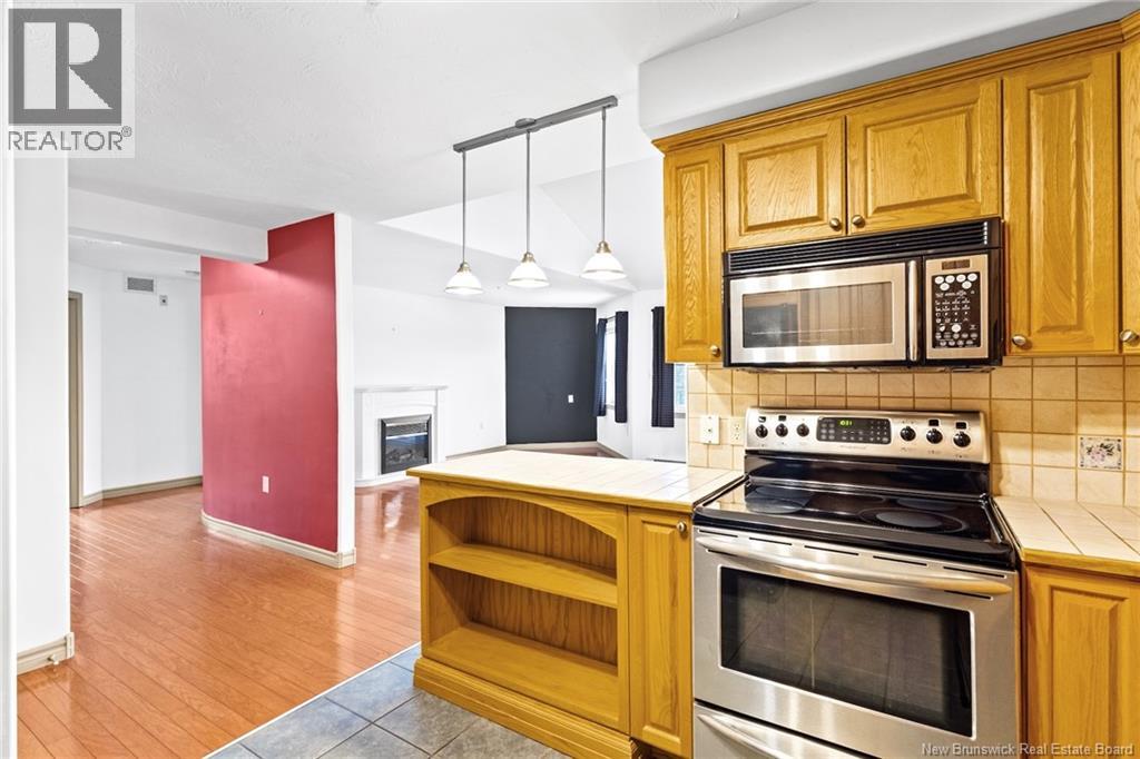 1 Golf Greens Lane Unit# 409, Fredericton, New Brunswick  E3B 9T9 - Photo 24 - NB136037
