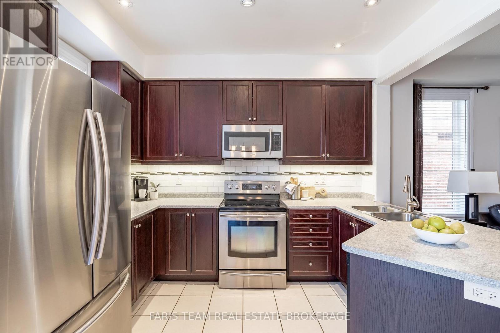 93 Collier Crescent, Essa, Ontario  L3W 0M8 - Photo 6 - N12934116