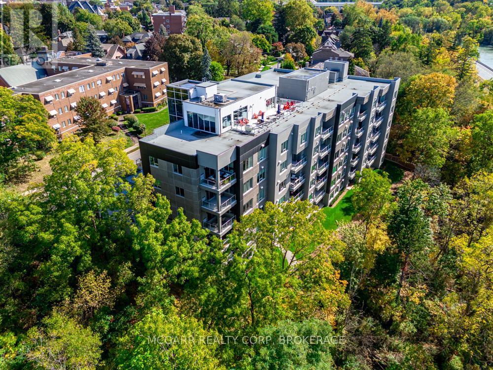 403 - 77 Yates Street, St. Catharines (Downtown), Ontario  L2R 5R7 - Photo 2 - X12934456