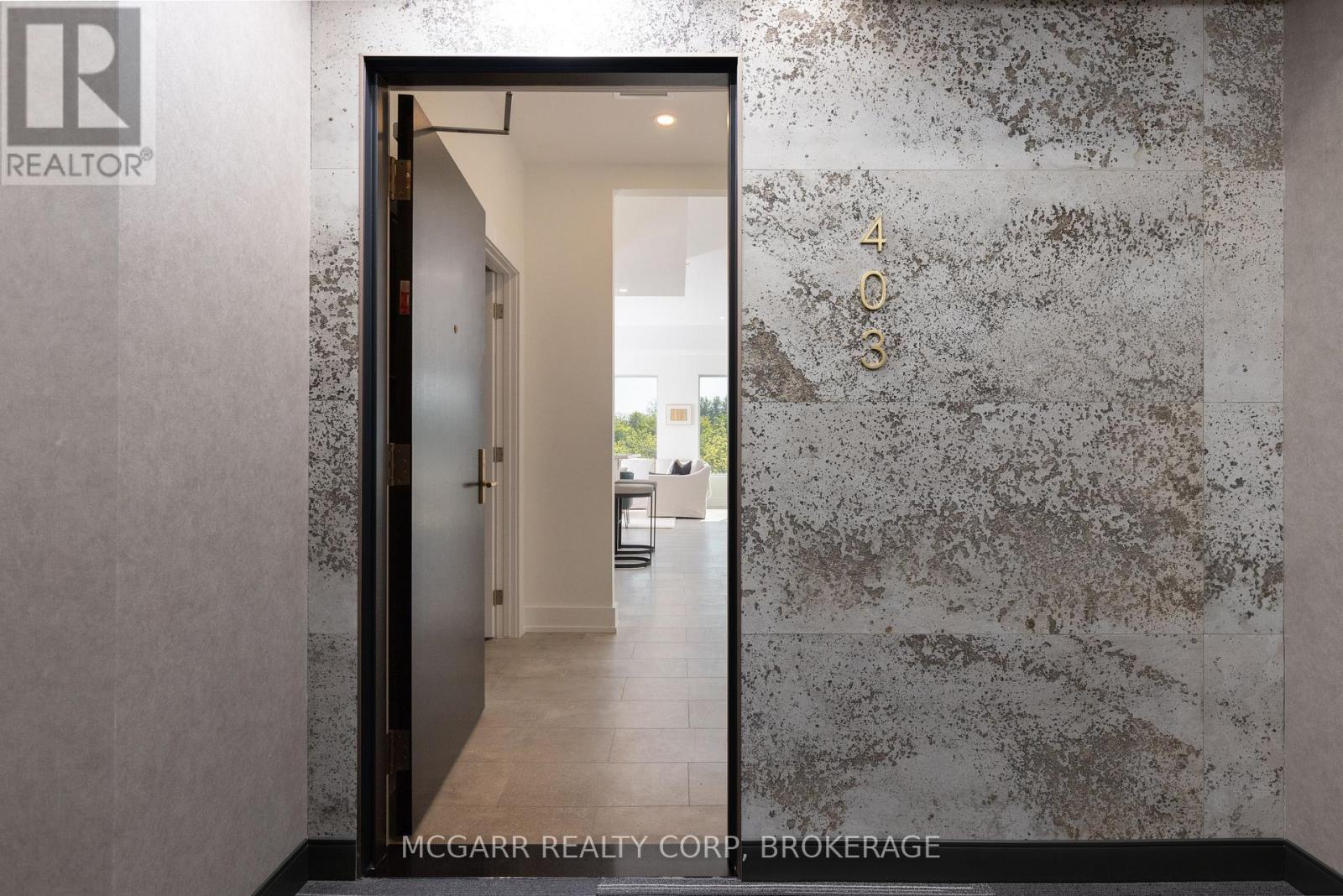 403 - 77 Yates Street, St. Catharines (Downtown), Ontario  L2R 5R7 - Photo 4 - X12934456