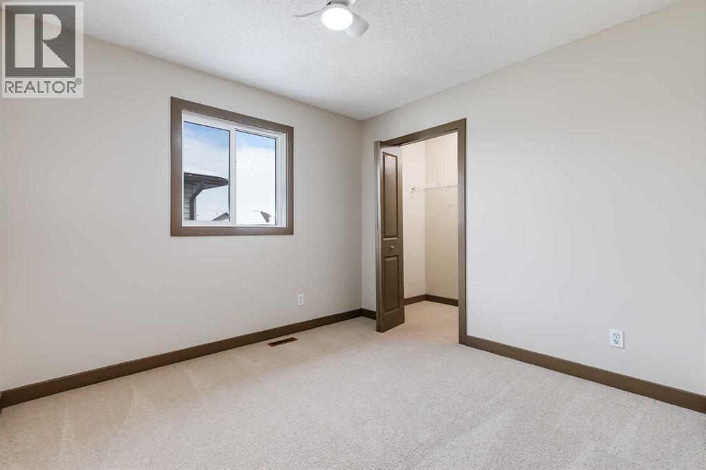 106 Luxstone Way SW, Airdrie, Alberta  T4B 0H6 - Photo 17 - A2290938