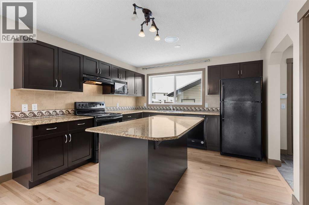 106 Luxstone Way SW, Airdrie, Alberta  T4B 0H6 - Photo 9 - A2290938