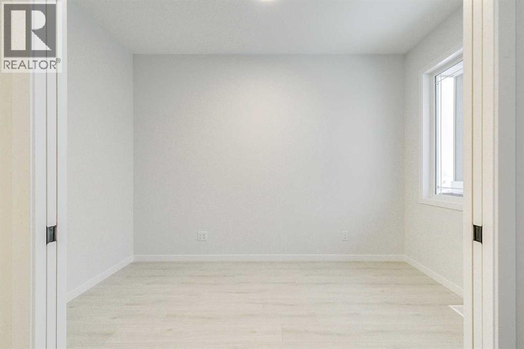 186 Creekside Manor SW, Calgary, Alberta  T2X 6J5 - Photo 8 - A2272147